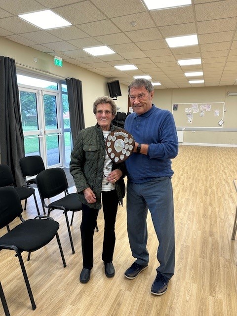 Mrs Audrey Stephenson receiving the Nellie Harpham Award from  Cllr Brian Brooks for her community work